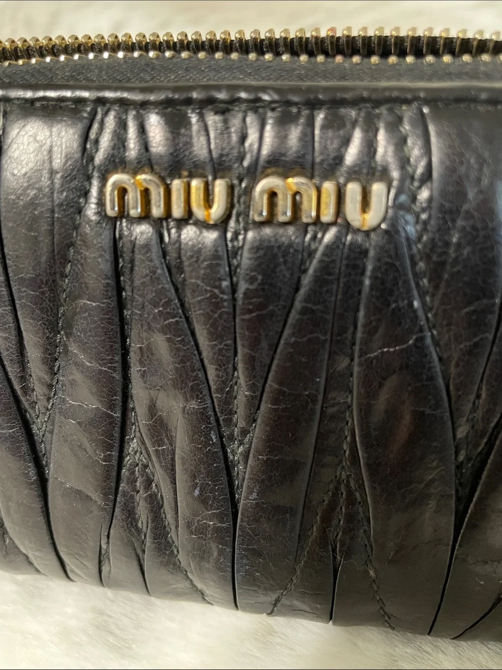 Miu Miu Black Quilted Zip-Around Wallet with Gold Logo